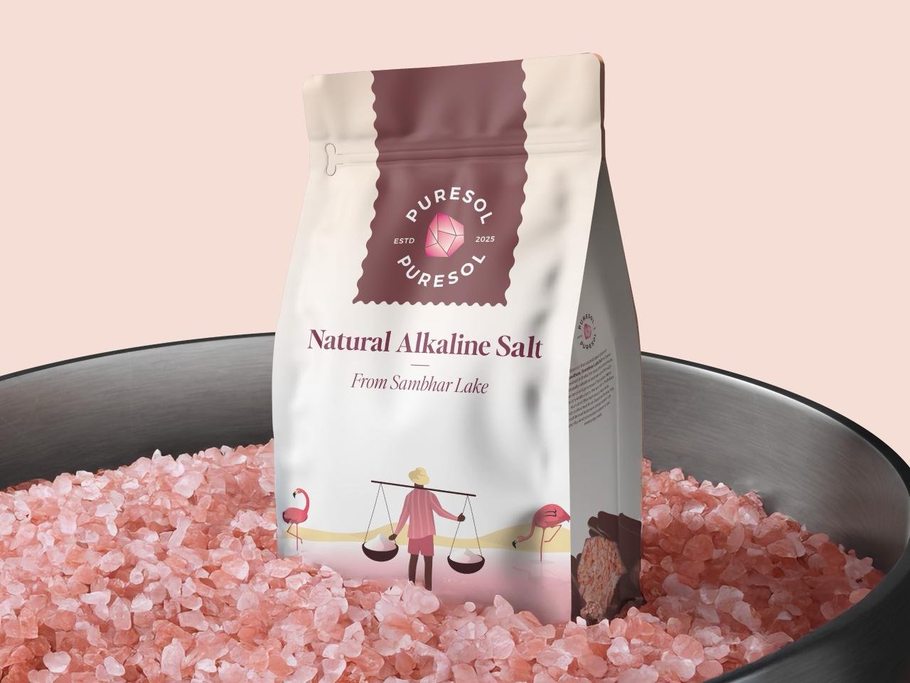 Puresol salt pack on pink Sambhar Lake brine — naturally coloured by Dunaliella salina