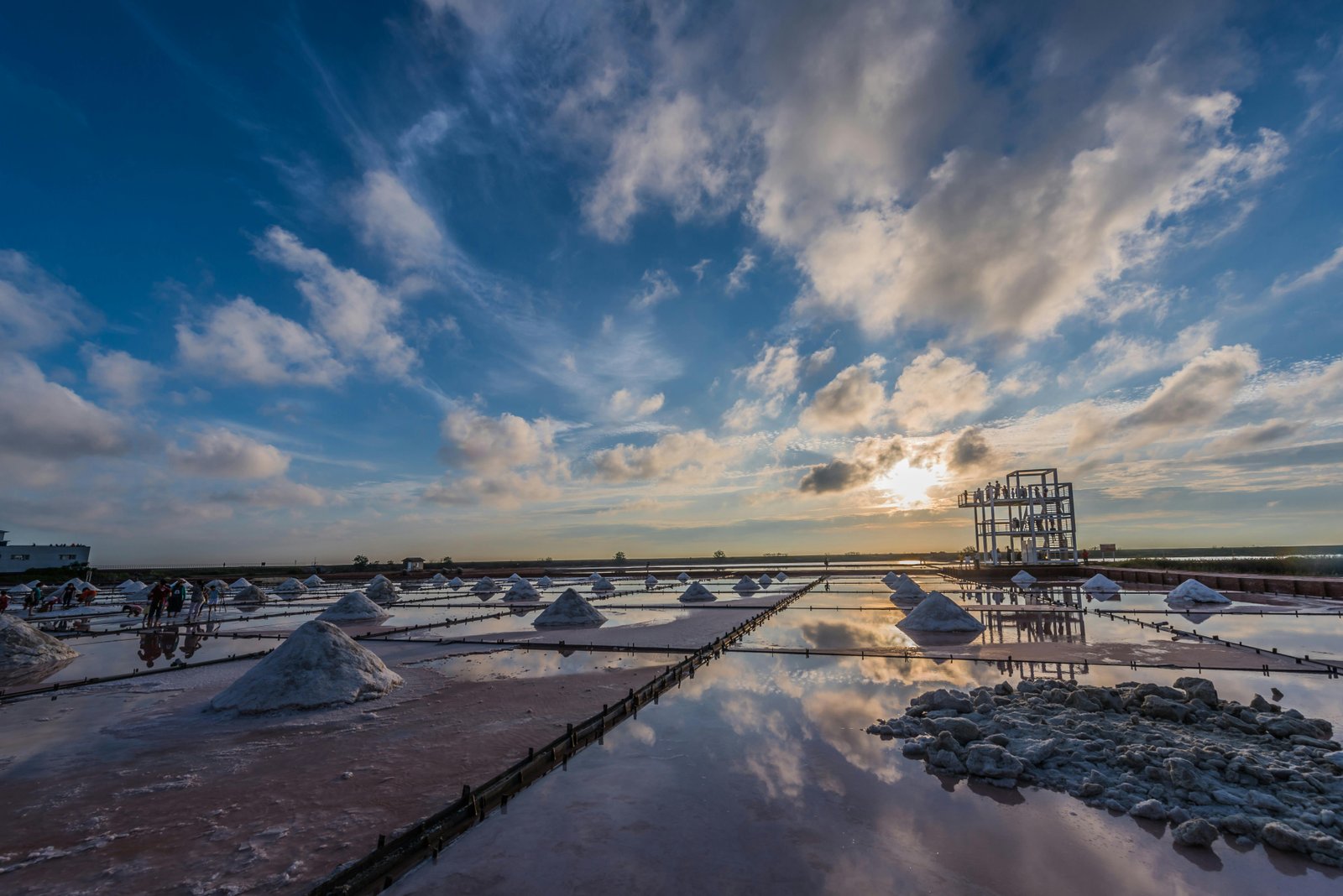 Salt pans under the intense Rajasthani sun during the sun-curing process